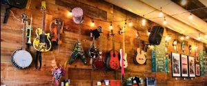 Guitars hanging from a wall